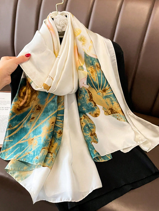 The Chic White Printed Silk Scarf is the perfect accessory for your spring and summer wardrobe. Its stylish design and soft silk material make it the ideal beach shawl for any fashion-forward individual. Made with quality materials, this scarf is both chic and versatile, adding a touch of elegance to any outfit.