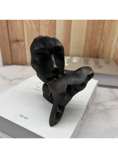 This Abstract Kiss Lover Figurine adds a romantic touch to any <a href="https://canaryhouze.com/collections/ornaments" target="_blank" rel="noopener">home decor</a>. Crafted with delicate details, it is a perfect way to express love and affection. Its abstract design captures the beauty of a kiss in a modern and unique way. Bring a touch of romance to your living space with this beautiful figurine.