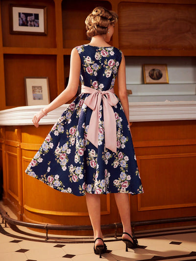 Vintage Rose Dream: Elegant Printed Dress with Bow Belt and Umbrella Skirt