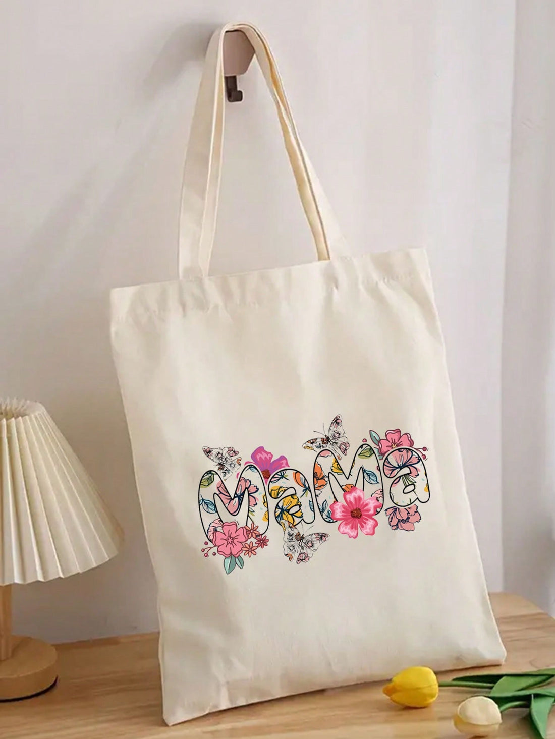 The Chic Mama Printed Tote <a href="https://canaryhouze.com/collections/canvas-tote-bags?sort_by=created-descending" target="_blank" rel="noopener">Bag</a> is the ultimate storage solution for every occasion. With its stylish design and ample space, this tote bag is perfect for carrying all your essentials in one place. Its versatile functionality makes it a must-have for any busy mom on the go. Stay organized and fashion-forward with this chic tote bag.
