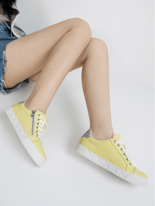 Introducing Chic Comfort: Women's Flat <a href="https://canaryhouze.com/collections/women-canvas-shoes" target="_blank" rel="noopener">Sneakers</a> with Stylish Zipper Detail. Designed for both style and comfort, these sneakers feature a unique zipper detail that adds modern flair to any outfit. With its flat design and quality materials, you'll enjoy all-day comfort and chic fashion in one.