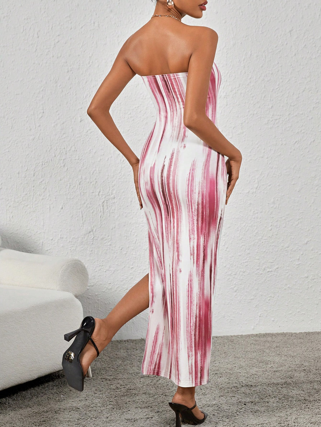 Unleash your inner fashionista with this one-of-a-kind Tie-Dye High Split Strapless Dress! Featuring a trendy tie-dye pattern, high side slit, and playful side cutout, this dress is perfect for all your summer adventures. Show off your unique style in this eye-catching dress (and maybe turn a few heads)!