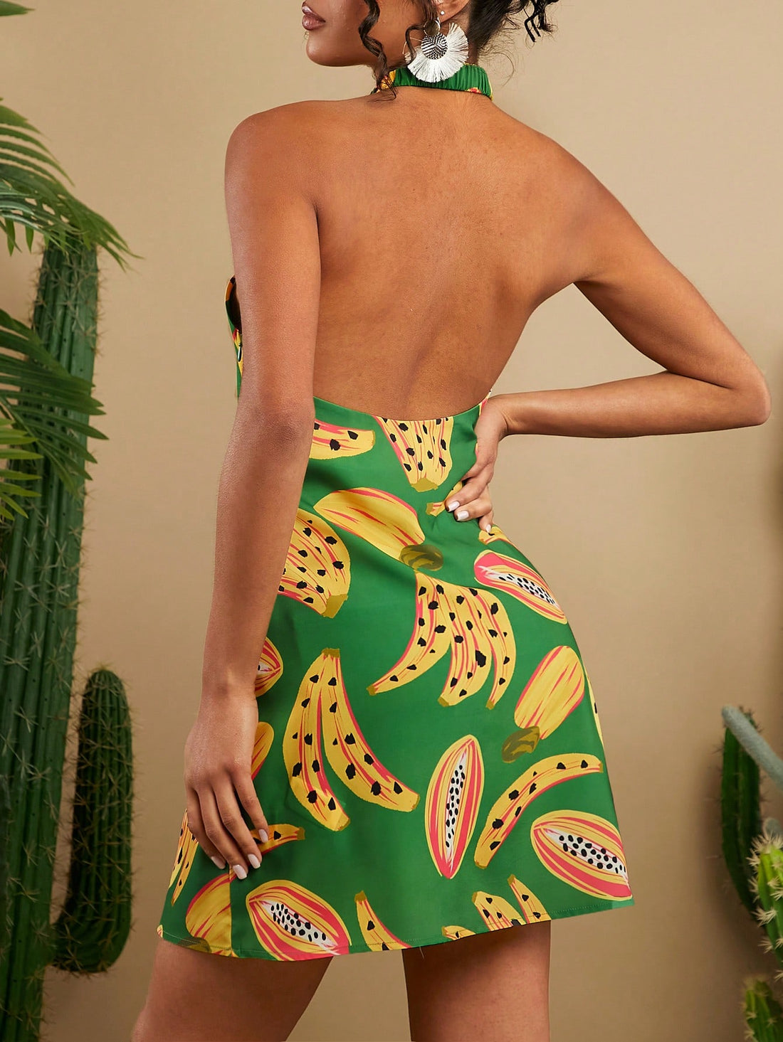 Indulge in the vibrant colors and playful print of our Fruity Fiesta halter neck dress. Crafted with a woven fabric, this dress is perfect for a summer vacation. Its unique design and comfortable fit will make you stand out while providing a fun and stylish look. Say hello to the perfect dress for your next getaway!