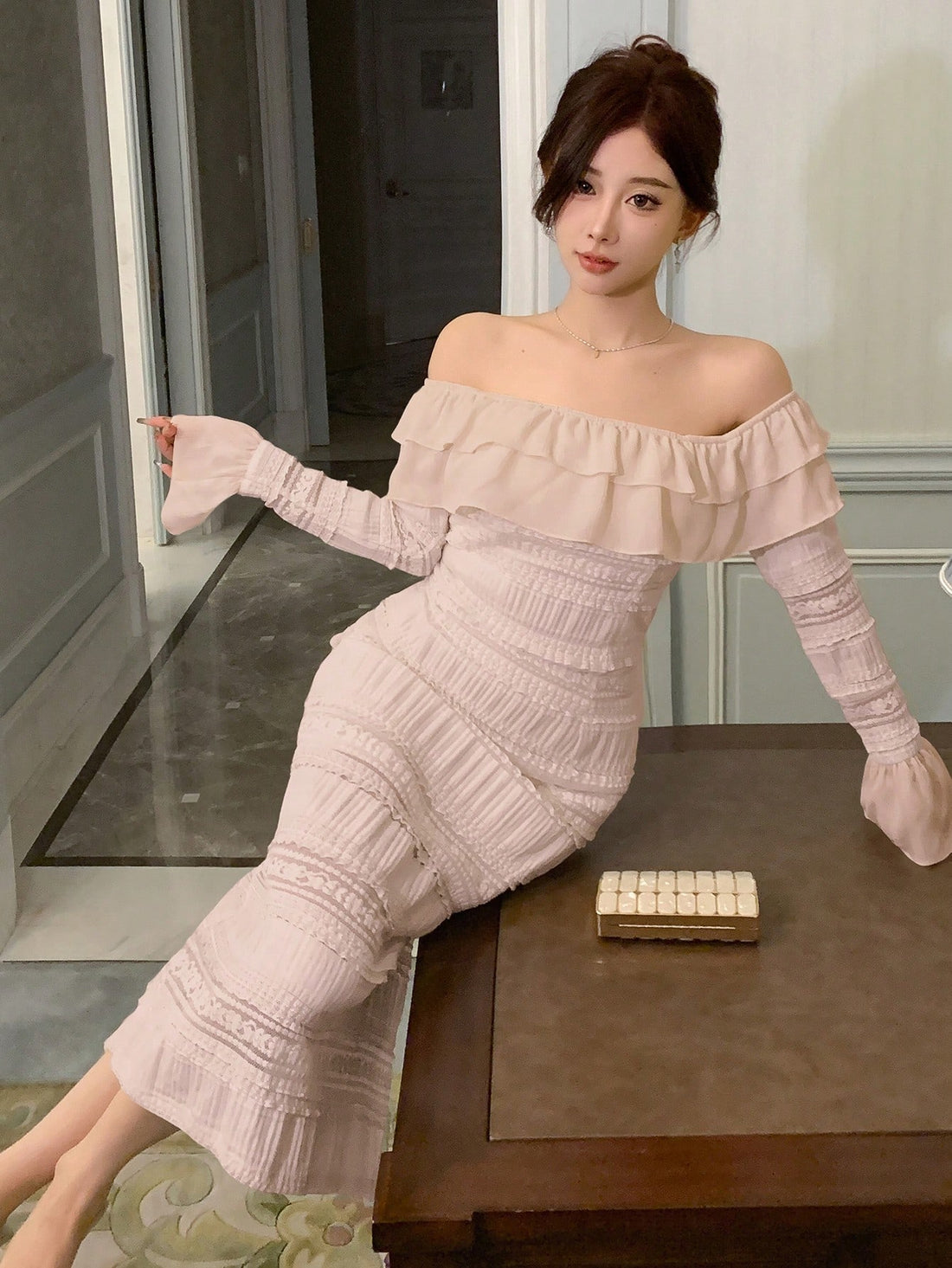 This Lovely in Lavender dress boasts an off-shoulder design with delicate ruffle trim, creating a feminine and stylish look. Made with soft and flowy fabric, it offers both comfort and elegance. Perfect for any occasion, this dress is a must-have for any woman's wardrobe.