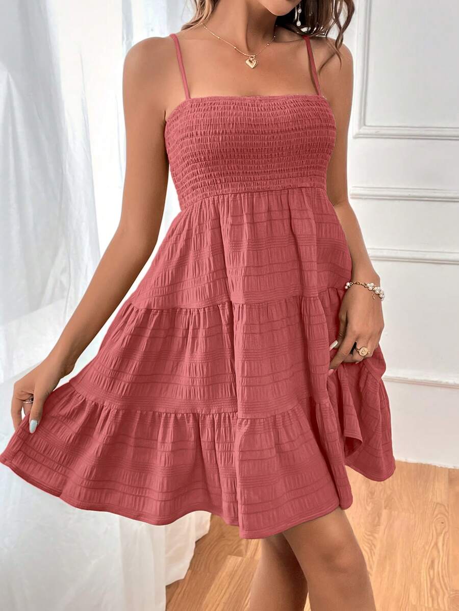 Dusty rose mini sundress with smocked bodice thin straps and tiered skirt