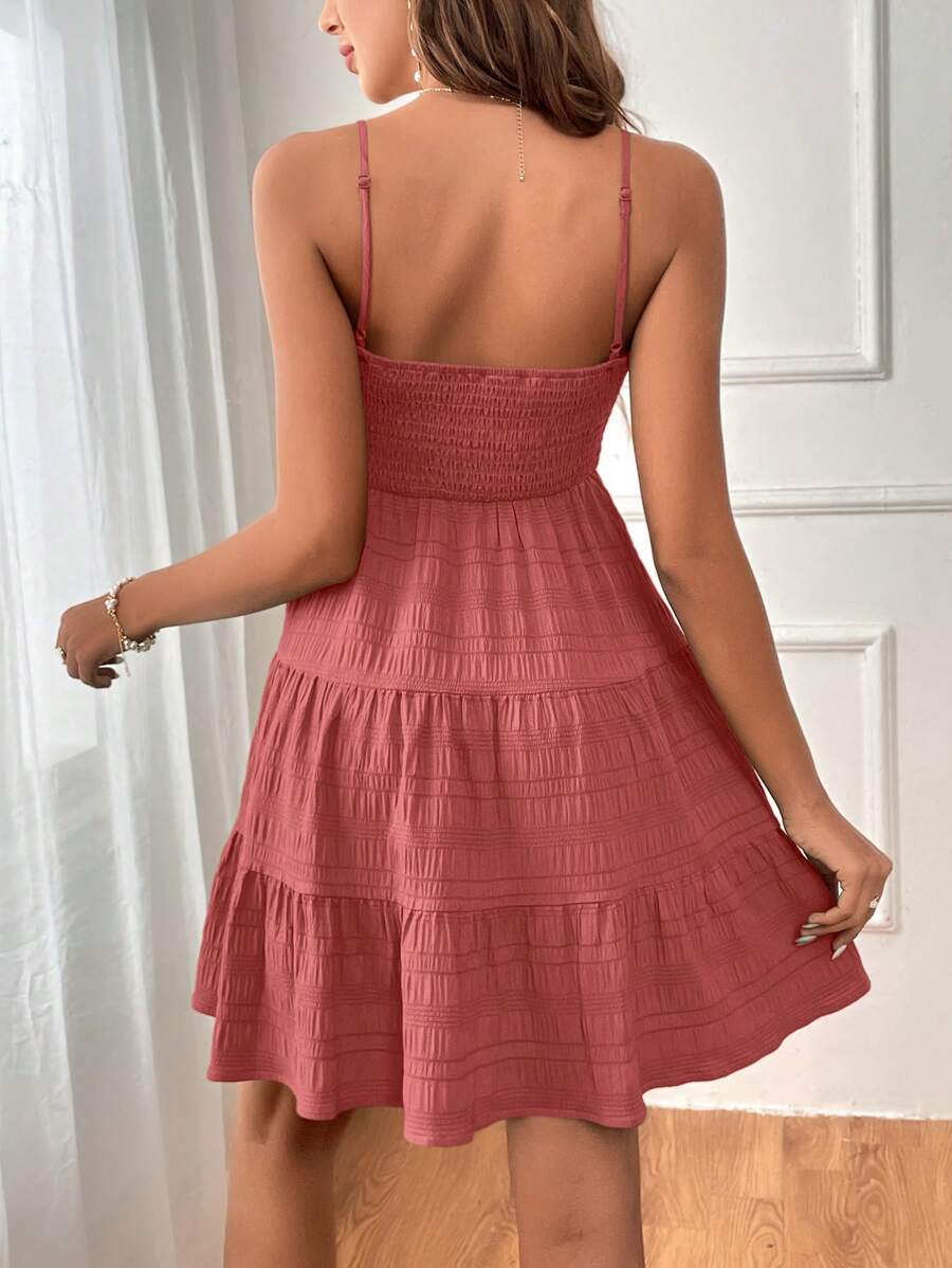 Dusty rose mini sundress with smocked bodice thin straps and tiered skirt