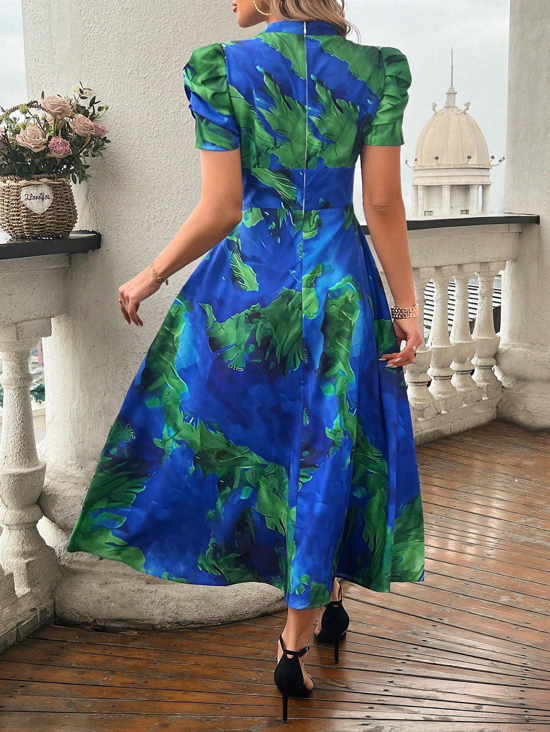 Be chic and playful in our Summer V-Neck Maxi Dress. With a vibrant tropical plant print and puffy sleeves, you'll be the center of attention at any summer event. Stay cool and stylish all season long!