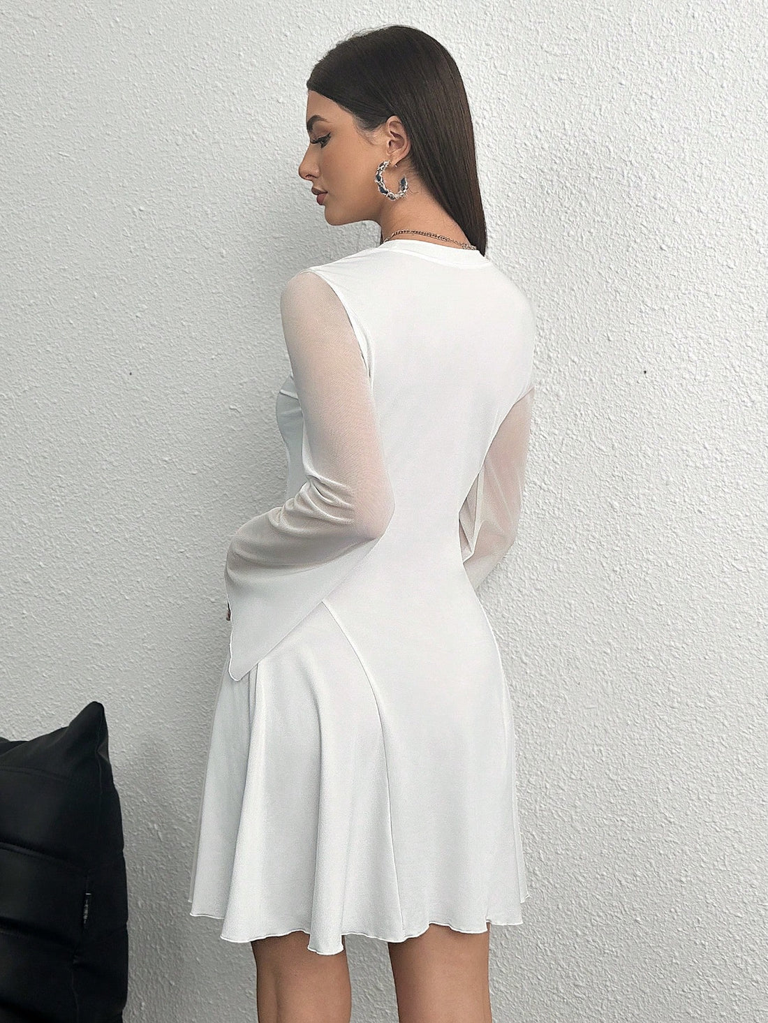 Step into your graduation day with a playful twist in this Sheer A-Line Dress. Featuring flirty flare sleeves and a gathered waist, it offers a flattering silhouette that dances with every move. Perfect for spring and summer celebrations, its light, airy fabric keeps you cool while making a stylish statement. Celebrate your achievements in comfort and charm!