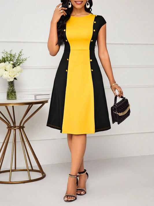 Elevate your style with our Chic and Colorful <a href="https://canaryhouze.com/collections/women-dresses" target="_blank" rel="noopener">dress</a>. This stunning Women's Colorblock Button Decorated Dress is the perfect balance of fashion and functionality. With a unique colorblock design and elegant button details, you'll make a statement wherever you go.