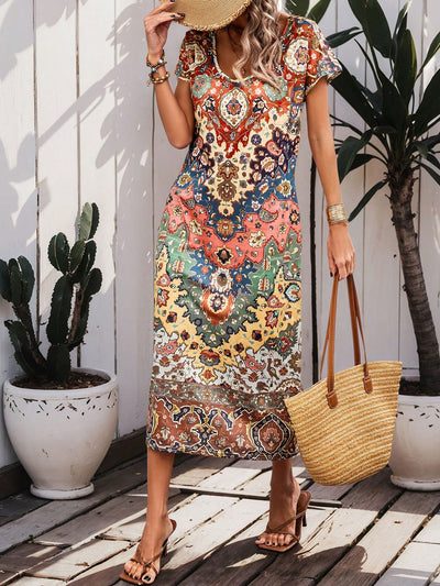 The Beach Babe dress is perfect for a casual summer look with its random printed design and short sleeves. Made for comfort and style, this dress is sure to turn heads. Stay cool and chic with this must-have addition to your wardrobe.