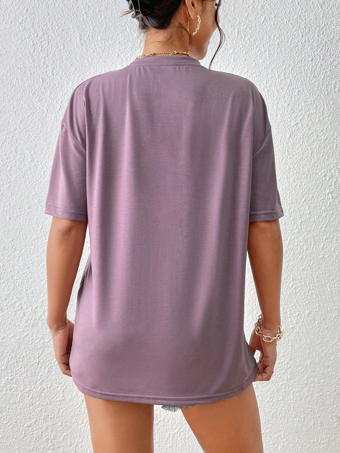 Get ready for some serious mom style with this trendy summer t-shirt! Featuring a playful cartoon and letter print, this short sleeved graphic tee is perfect for adding a quirky touch to your wardrobe. With its lightweight fabric and stylish design, you'll be sure to turn heads all summer long.