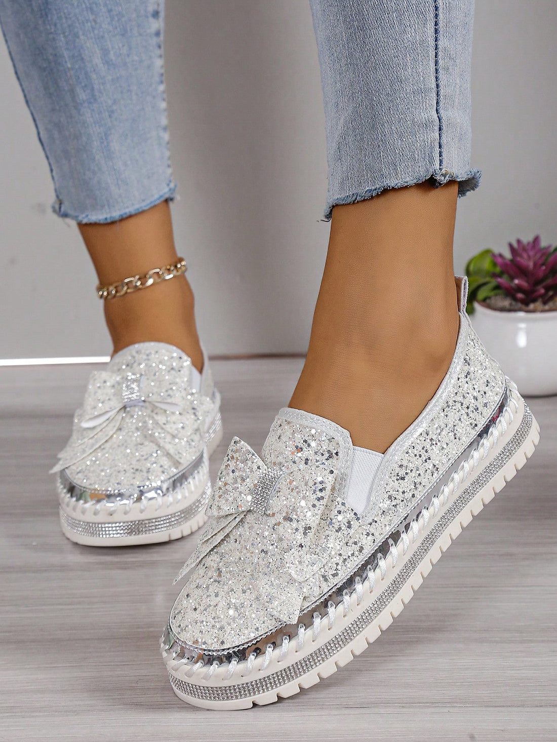 Elevate your athletic style with our Diamond Encrusted Plus Size Sports Shoes. Adorned with exquisite diamonds and a beautiful butterfly flower stitching edition, these shoes are perfect for those who want to stand out. Made for ultimate comfort and support, these shoes are the perfect combination of fashion and function.