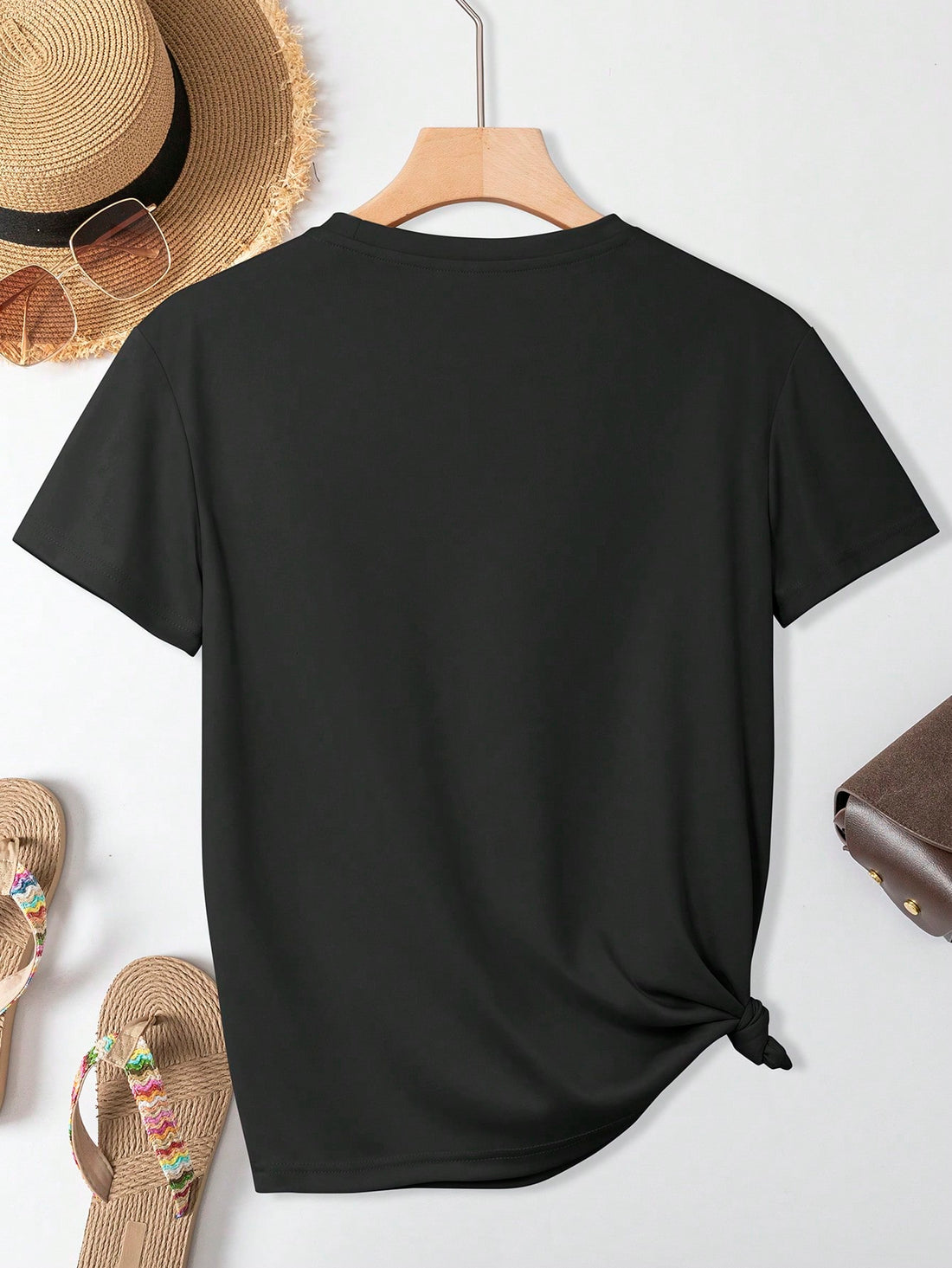 Get your summer vibes on point with this playful and stylish tee! Featuring a fun graphic slogan and easygoing fit, this tee will keep you cool and comfy in the summer heat. Perfect for casual outings or lounging at home. So why wait? Add some easy breezy vibes to your wardrobe now!