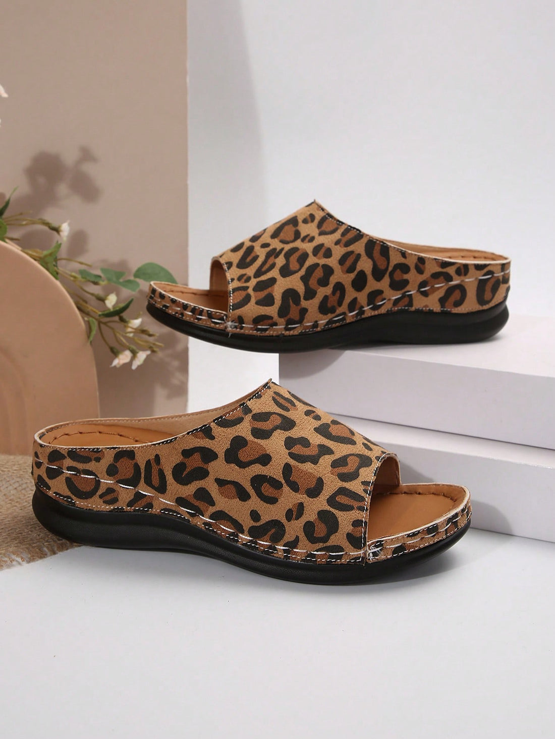 Step up your beachwear game with our Leopard Print Summer Mules. The stylish leopard print design will add an edgy touch to any summer outfit, while the comfortable fit makes them perfect for all-day wear. Elevate your beach style and turn heads with these must-have mules.