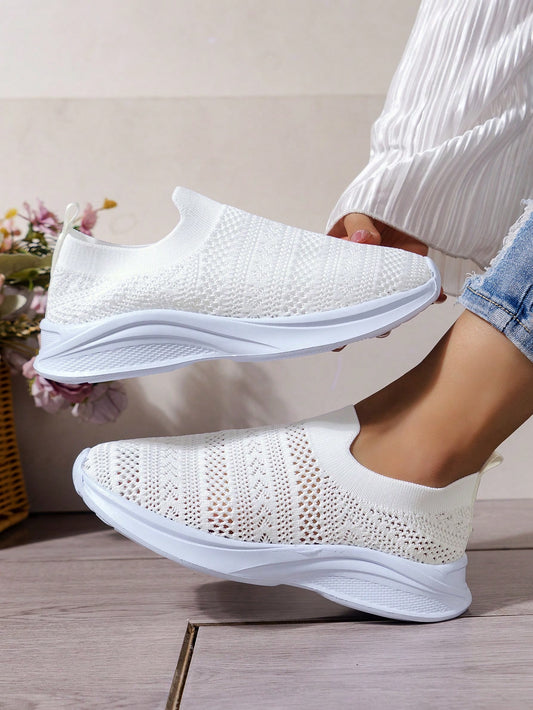 Introducing our Stylish &amp; Sporty White Knitted Lightweight Running Shoes for Women. Designed for comfort and performance, these shoes feature a stylish and lightweight knitted construction. Perfect for any workout or casual wear, these shoes offer a combination of style and functionality that will elevate your fitness game.