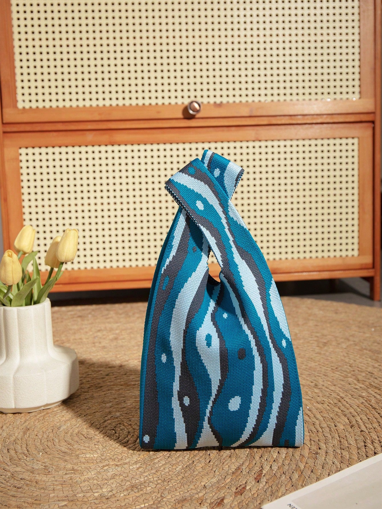 Introducing the Colorful Crochet Ripple Handbag - your perfect companion for all seasons! With its vibrant colors and stylish crochet design, this versatile carry-all is not only eye-catching but also durable. Whether it's for everyday use or special occasions, this handbag has got you covered!