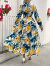 Vintage Vibes: Ditsy Floral Print Dress with Flounce Sleeve and Ruffle Hem