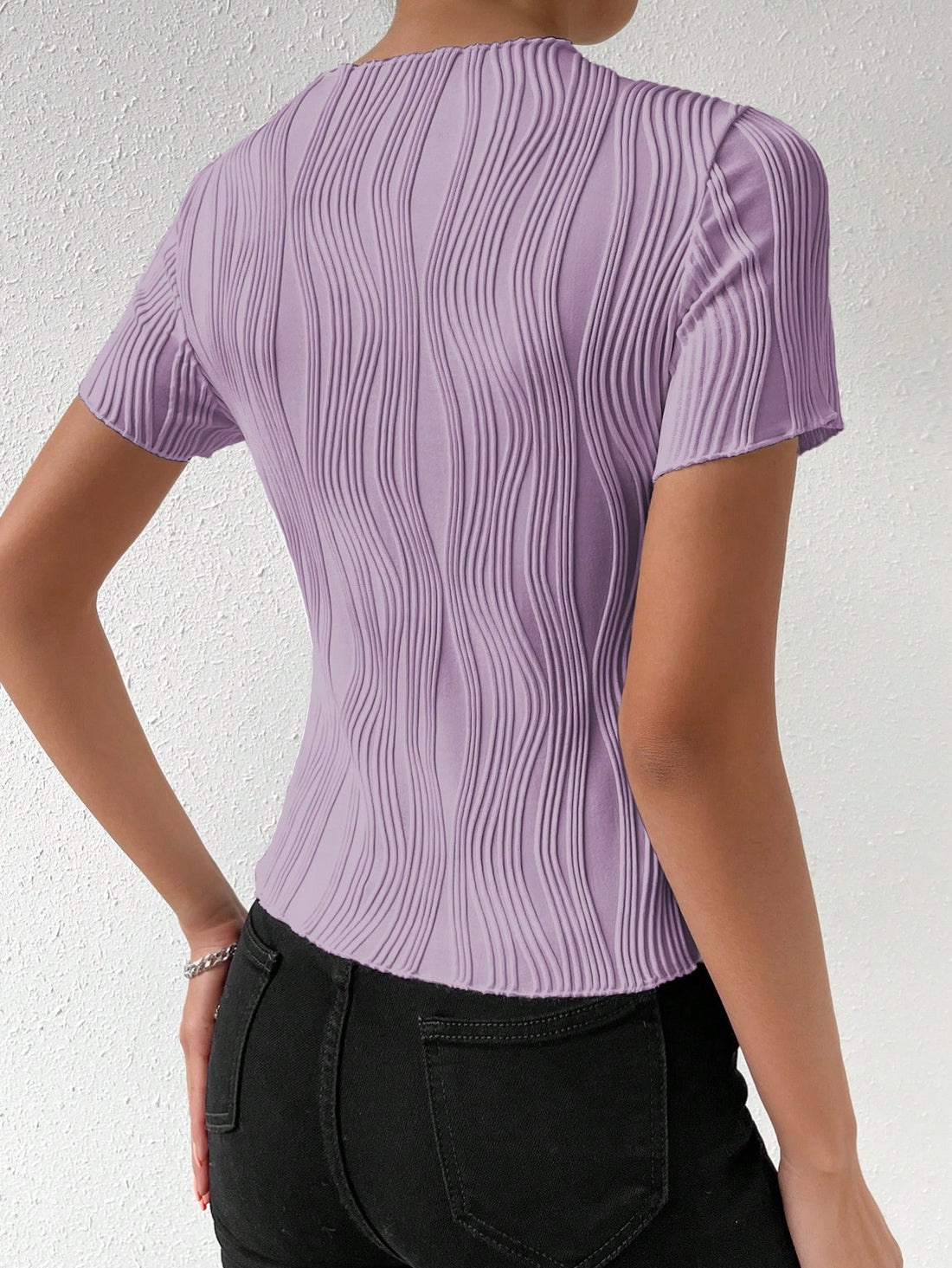 Add some summertime chic to your wardrobe with our Solid Color Texture Short Sleeve T-Shirt in Mint Green. This stylish top is perfect for warm weather with its short sleeves and refreshing mint color. Made with high-quality materials, it's both comfortable and fashionable. Upgrade your summer look today!