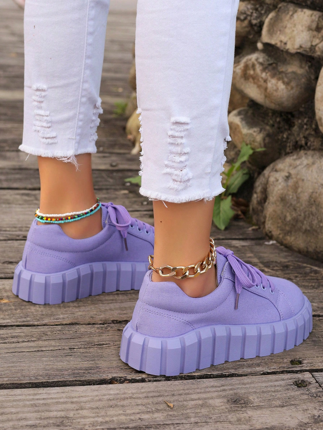 Introducing our new Spring and Summer Collection: Women's Purple Thick-Bottomed Canvas Sneakers. Designed with a durable canvas material and thick-bottomed sole, these sneakers provide comfort and style. Perfect for any casual occasion, elevate your wardrobe with a pop of color.