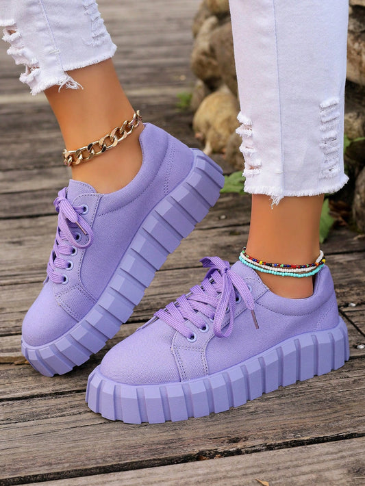 Introducing our new Spring and Summer Collection: Women's Purple Thick-Bottomed Canvas Sneakers. Designed with a durable canvas material and thick-bottomed sole, these sneakers provide comfort and style. Perfect for any casual occasion, elevate your wardrobe with a pop of color.