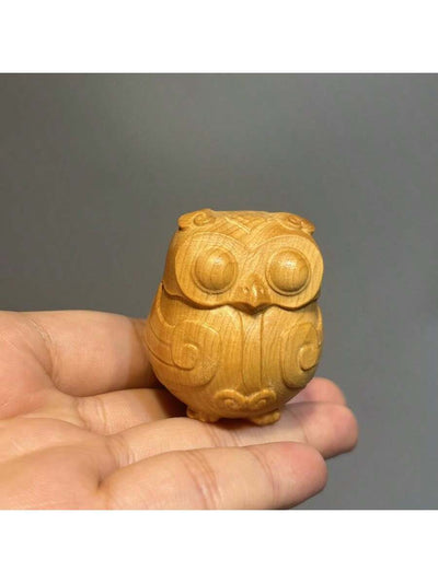 This charming hand-carved owl furniture handle is the perfect addition to your desktop, adding a touch of whimsy and personality. Crafted with precision and intricate details, this handle doubles as a decorative piece that will surely catch the eye. Elevate your <a href="https://canaryhouze.com/collections/ornaments" target="_blank" rel="noopener">home decor</a> with this unique and functional handle.