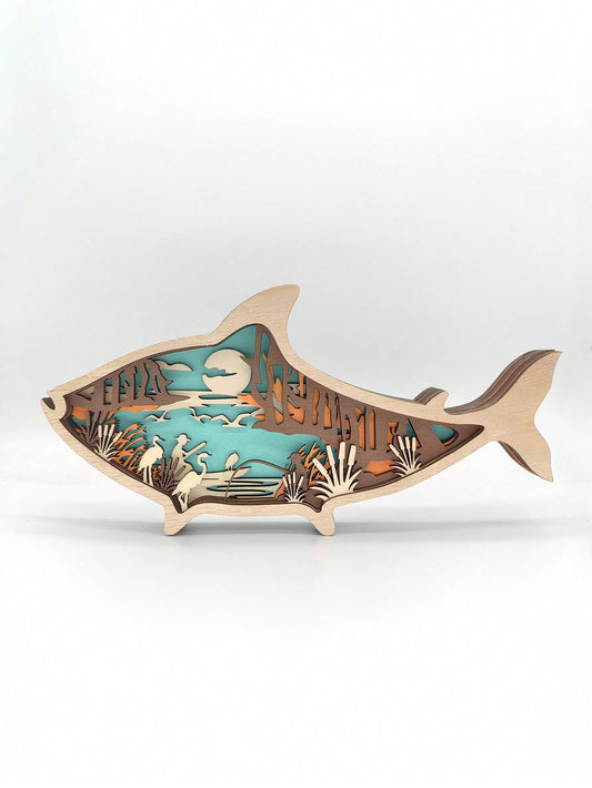 Expertly handcrafted, this Oceanic Fish Carving is a stunning <a href="https://canaryhouze.com/collections/wooden-arts" target="_blank" rel="noopener">wooden decoration</a>&nbsp; for any home or office. The intricate design captures the beauty of the ocean, making it perfect for beach or nautical themed rooms. Add a touch of elegance and nature to your space with this unique piece.