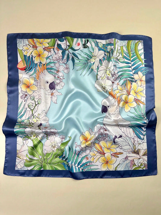 Elevate your style with our Colorful Macaw Birds and Tropical Florals Print Square Scarf. Made for the fashion-forward woman, this stylish hair accessory adds a pop of color and tropical vibes to any outfit. Enjoy the soft and lightweight feel, perfect for all seasons. Try it today!