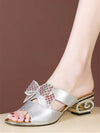Elevate your summer style with our Summer Chic: Rhinestone Bowknot <a href="https://canaryhouze.com/collections/women-canvas-shoes?sort_by=created-descending" target="_blank" rel="noopener">High Heel</a> Sandals. These sandals feature a sparkling rhinestone bowknot design, adding a touch of elegance to any outfit. With a comfortable high heel, these sandals are perfect for any occasion.