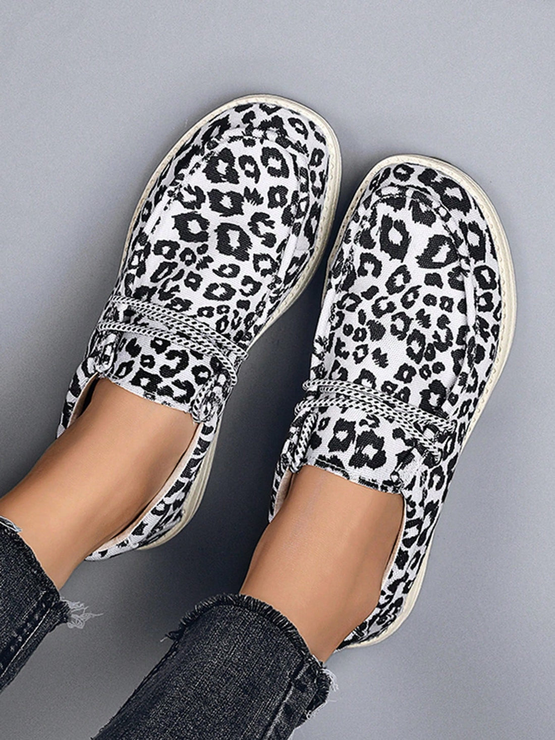 These Summer Slip-On <a href="https://canaryhouze.com/collections/women-canvas-shoes?sort_by=created-descending" target="_blank" rel="noopener">Sneakers</a> offer a perfect blend of comfort and style for women. With their easy slip-on design, you can effortlessly slide them on for any occasion. The sleek and modern loafer design adds a touch of sophistication to your look. Stay comfortable and stylish all summer long.