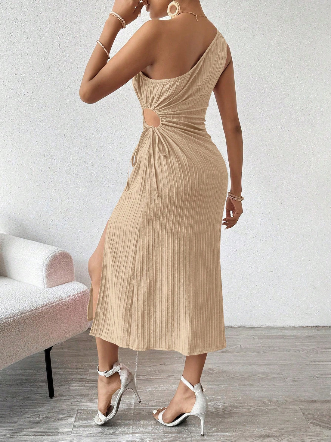 Effortlessly chic! Show off your style with our Hollow-Out Pleated Maxi Dress, featuring a trendy one-shoulder design and lightweight fabric perfect for spring and summer. With its pleated details, this dress will elevate your look and keep you cool and comfortable. Dress to impress! (Only available while supplies last!)