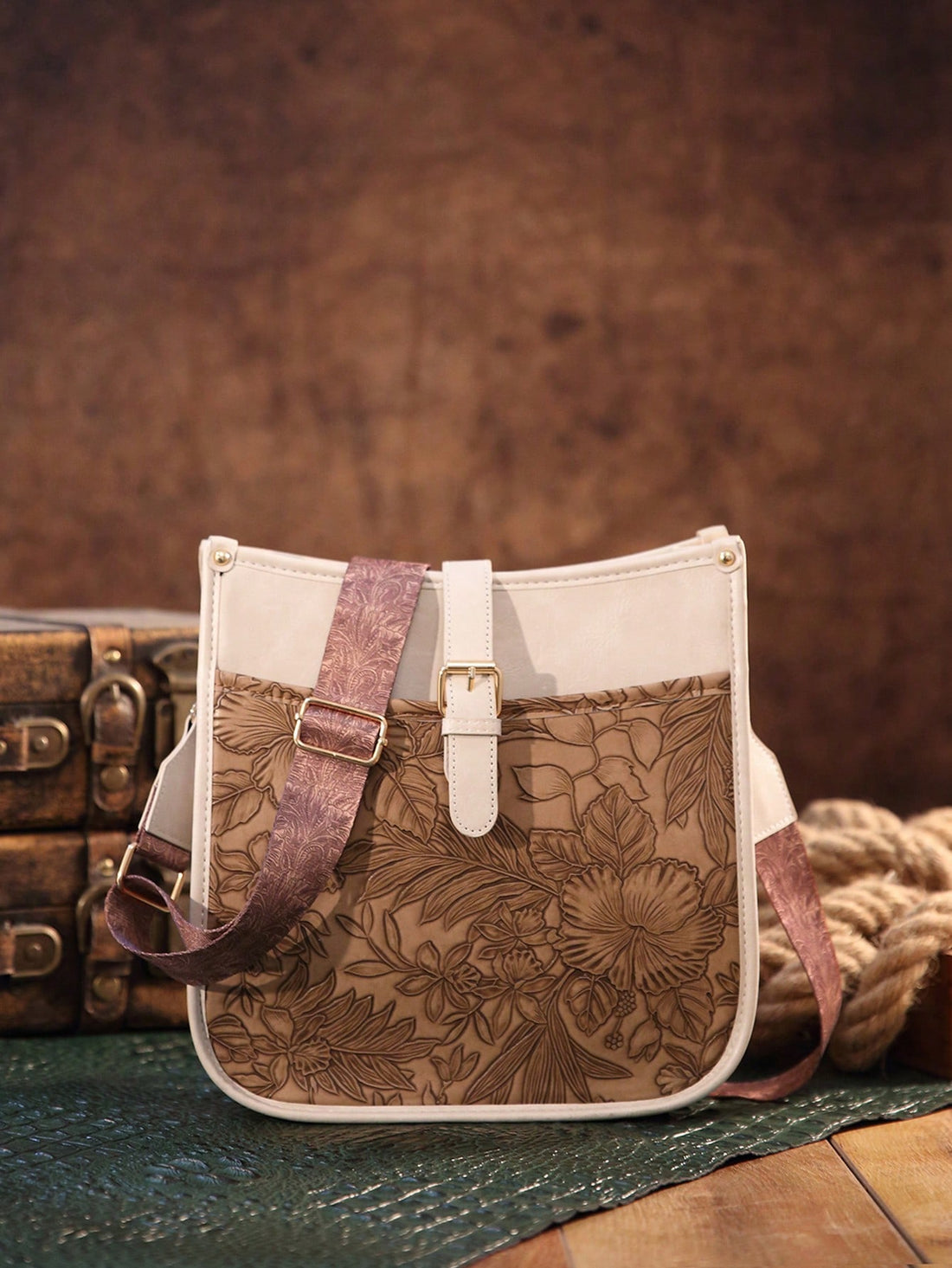 Introducing our Vintage Embossed Print Large Capacity Crossbody Bag for Women! With stylish embossed print and large capacity, it's perfect for the outdoor commuter. Keep your essentials organized and easily accessible while staying fashionable. Ideal for everyday use, travel, or any adventure.