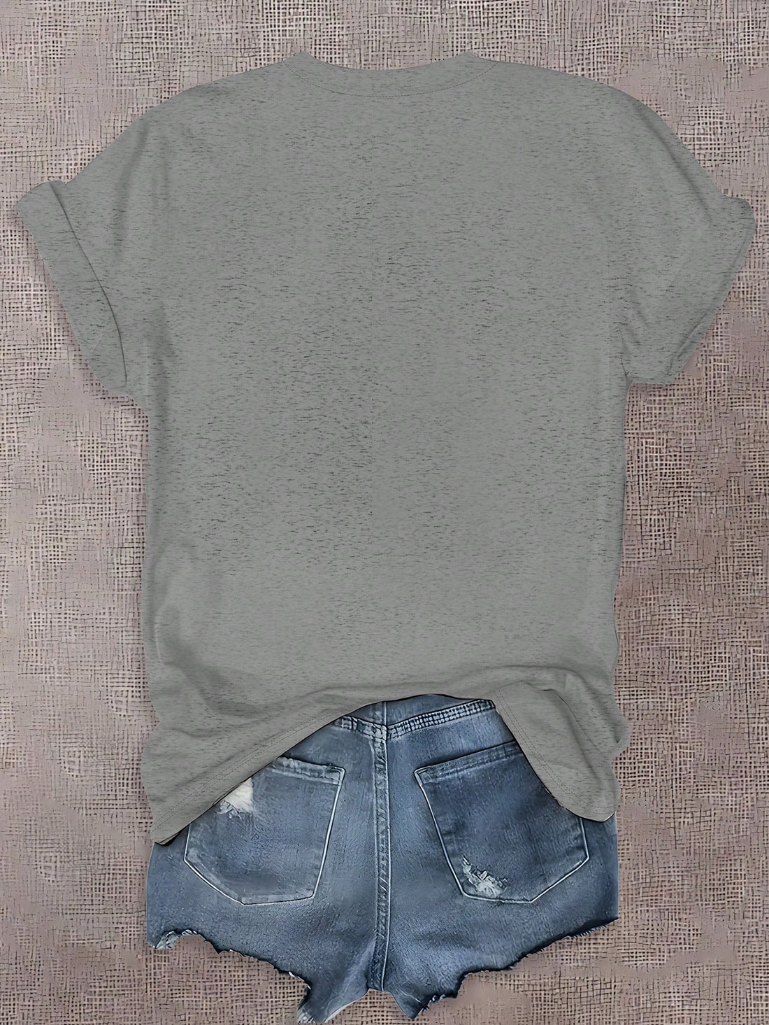 Unleash your quirky side with our Chic Casual Summer Tee! Featuring a playful donkey print and fun letter graphic, this round neck t-shirt is perfect for women looking for a unique style. Stay stylish and comfortable this summer with our eye-catching tee.