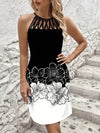 Bold and Beautiful: Black and White Printed Sleeveless Summer Dress with Netted and Spliced Design