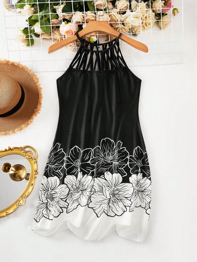 Bold and Beautiful: Black and White Printed Sleeveless Summer Dress with Netted and Spliced Design