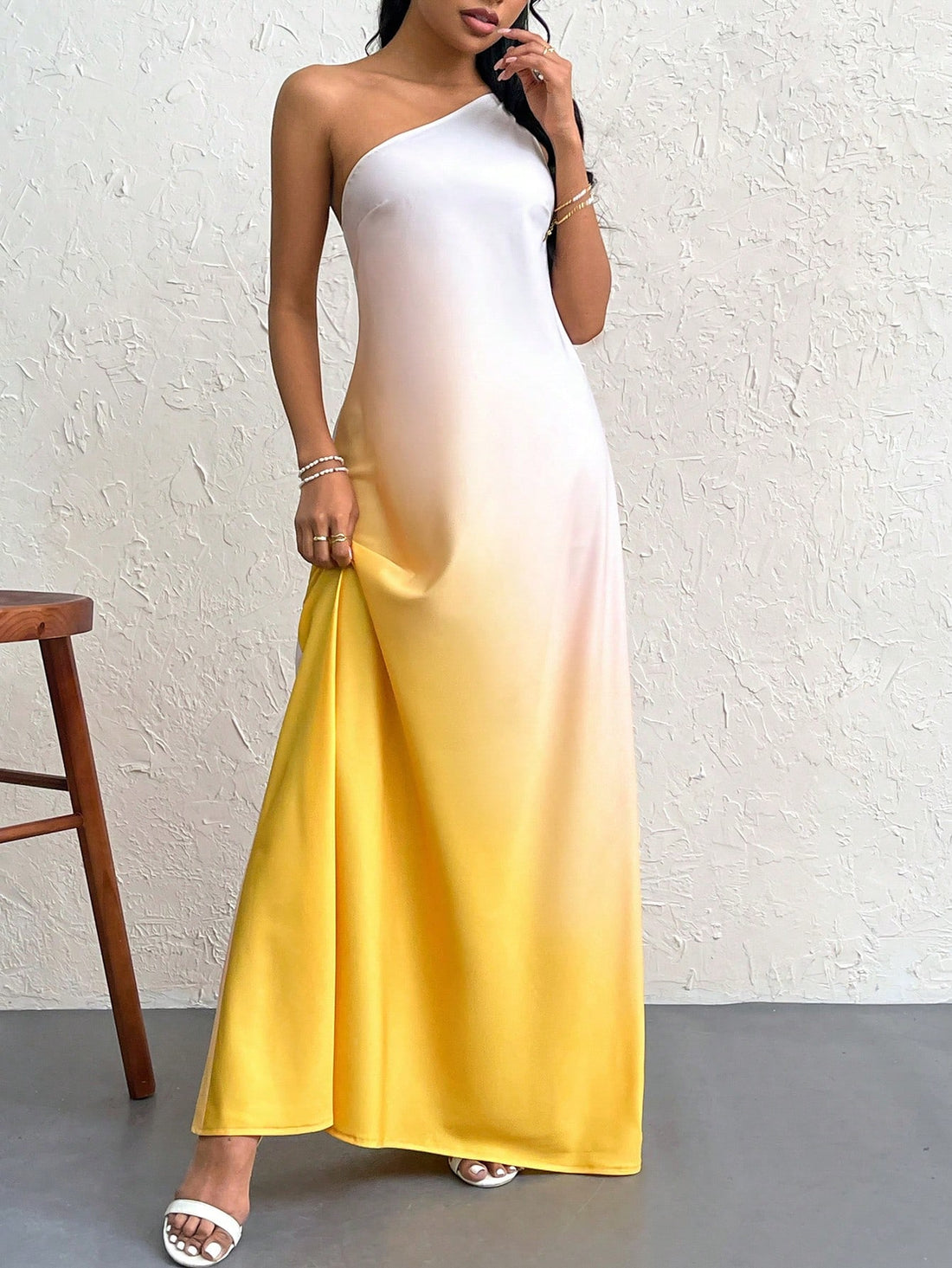 Effortlessly stunning and sophisticated, our Sunset Serenade dress features a gradient design, with a backless and single shoulder knot detail. Elevate your look with this elegant and unique dress, perfect for any special occasion.