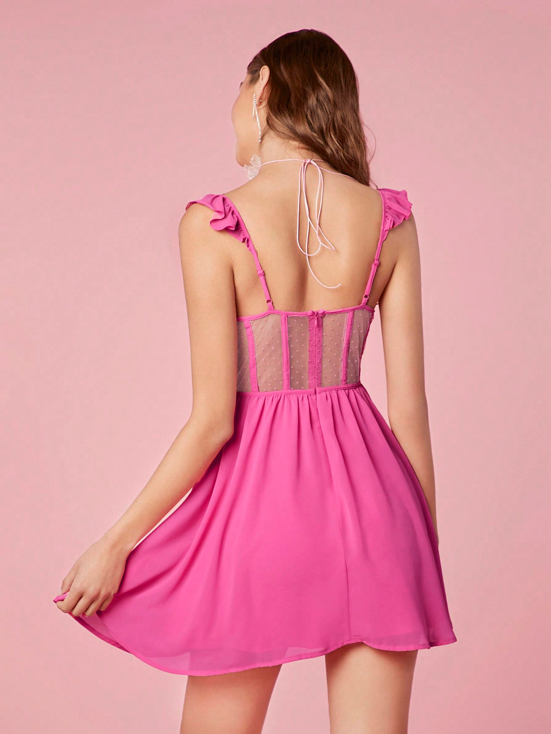 Get ready to turn heads at any spring or summer party with this chic pink mini dress! With delicate embroidery and playful ruffle edges, this dress is sure to make a statement. Lightweight and stylish, it's the perfect choice for any warm weather occasion.