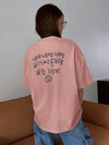 Empowerment in Print: Slogan Graphic Drop Shoulder Tee