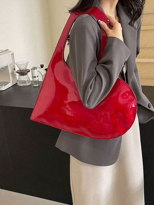 This stylish heart-shaped armpit bag is the perfect companion for shopping and attending shows. It allows you to keep your hands free while safely stashing your belongings, and its unique shape adds a touch of fashion to any outfit. Ideal for busy, on-the-go individuals looking for convenience and style.