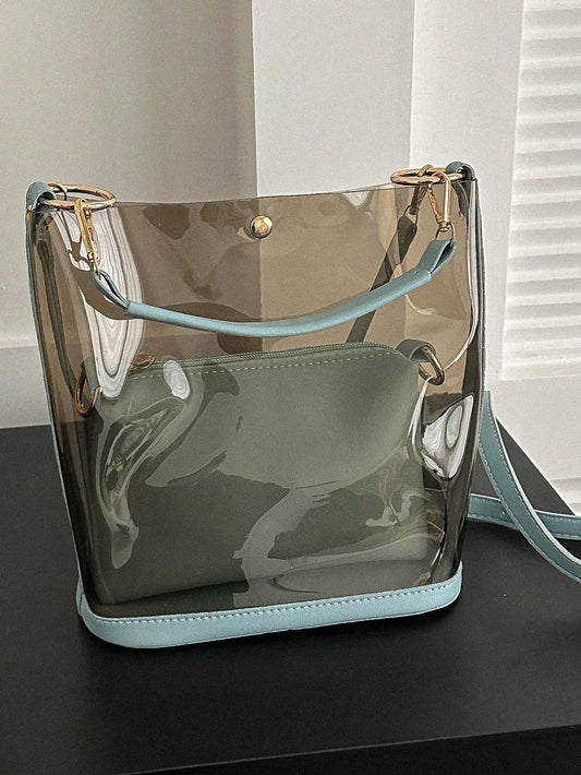 This Summer Chic Clear Jelly Handbag is perfect for any beach-goer. Its clear design gives it a trendy look while the jelly material makes it waterproof and easy to clean. With a spacious interior and comfortable shoulder straps, it's the ultimate beach-ready accessory.