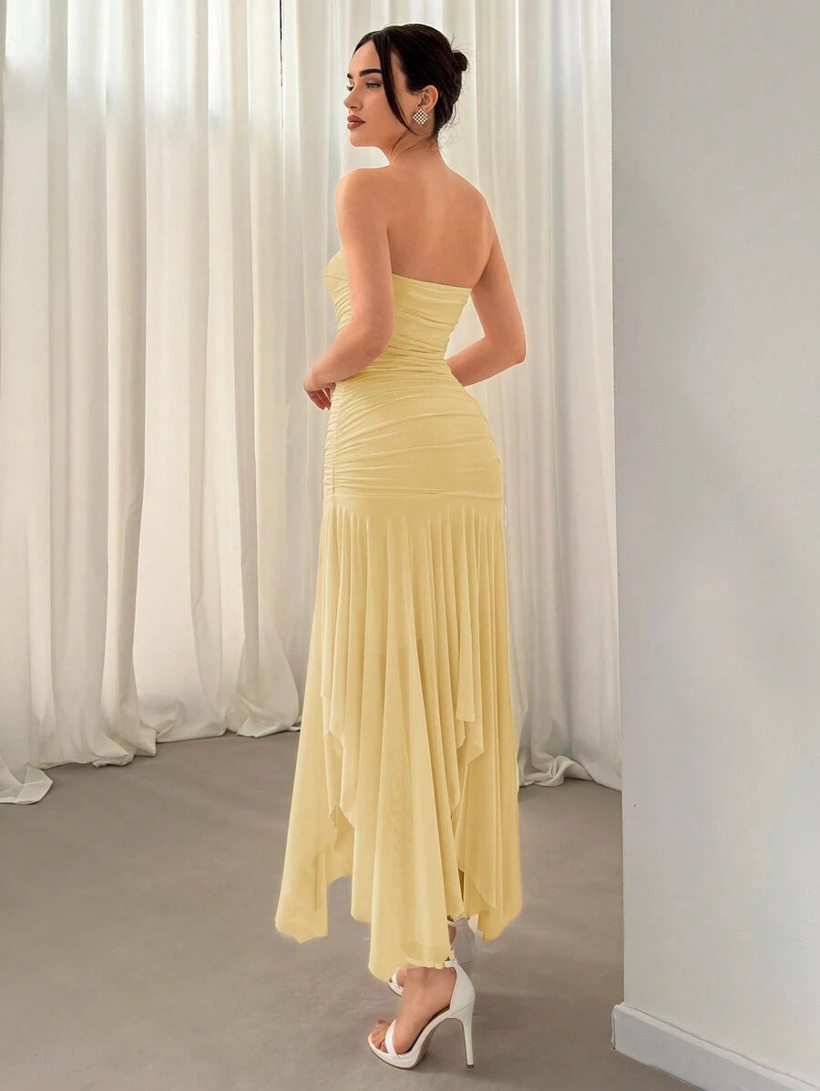 Yellow bandeau mesh dress with asymmetrical hem