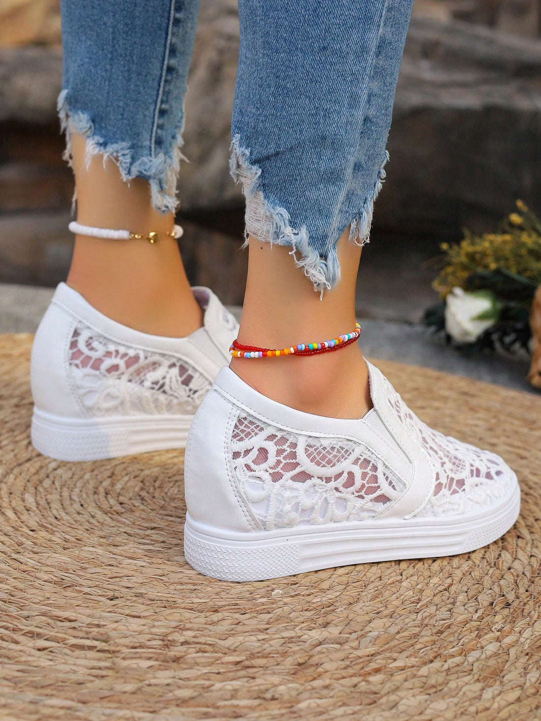 Take your sneaker game to the next level with our Elegant White Lace Wedge Sneakers. Designed with breathable materials to keep your feet cool and comfortable, these fashion-forward sneakers feature a subtle wedge for added height and style. Elevate any outfit and step up your fashion game with these must-have sneakers.