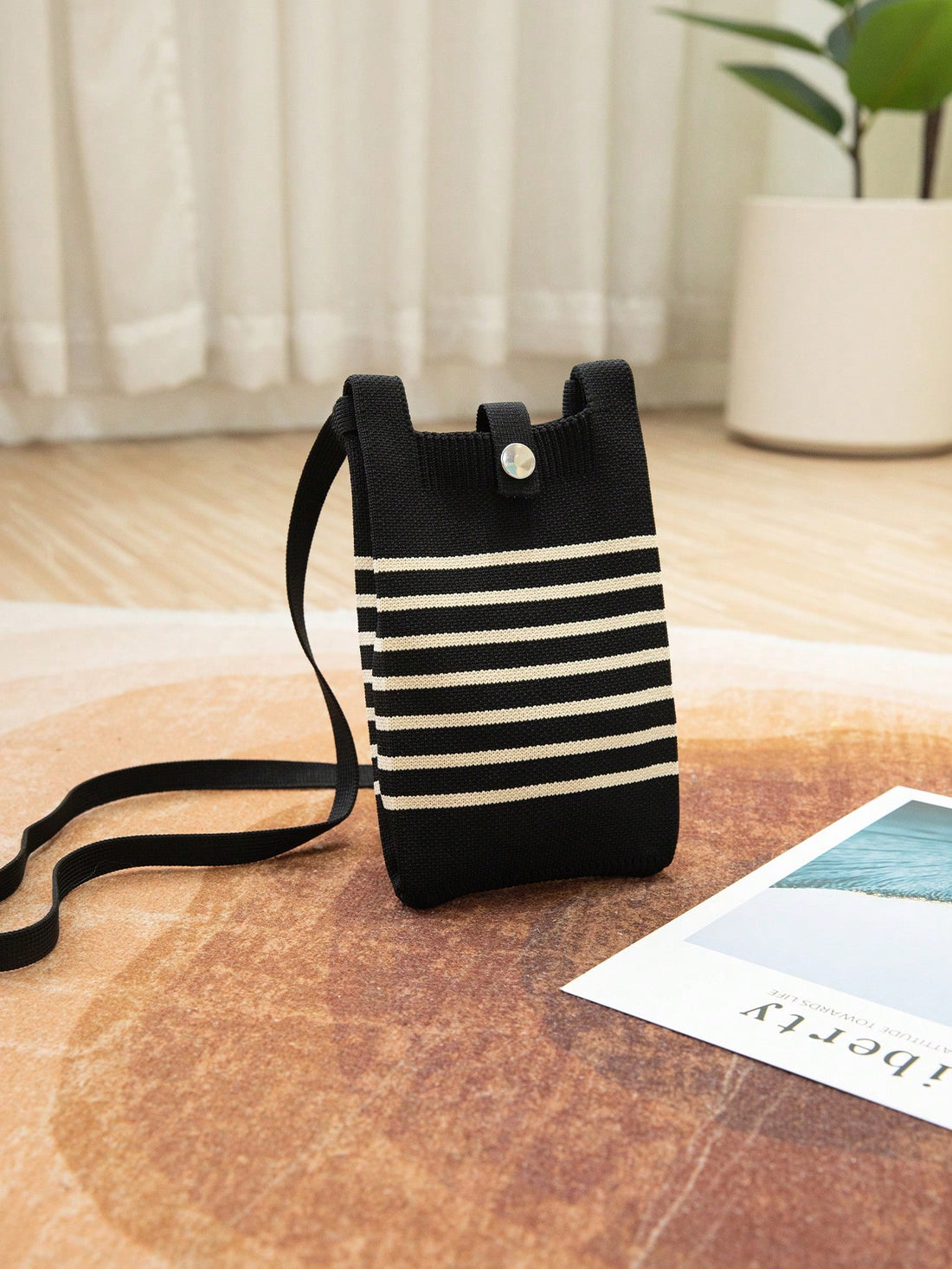 Upgrade your daily accessory with our stunning Black Striped Hollow Knitted Handbag. Perfect for traveling in style, this handbag is versatile enough for everyday use, vacations, camping trips, and more! With its sleek black stripes and unique hollow knit design, you'll be sure to turn heads wherever you go.