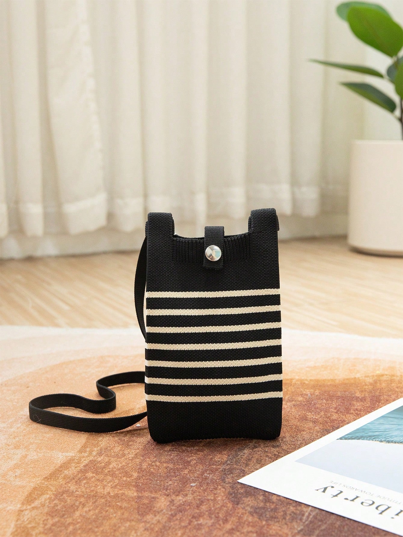 Upgrade your daily accessory with our stunning Black Striped Hollow Knitted Handbag. Perfect for traveling in style, this handbag is versatile enough for everyday use, vacations, camping trips, and more! With its sleek black stripes and unique hollow knit design, you'll be sure to turn heads wherever you go.