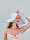 Boho Beach Chic: Women's Solid Wide Brim Straw Hat for Holiday Vibes