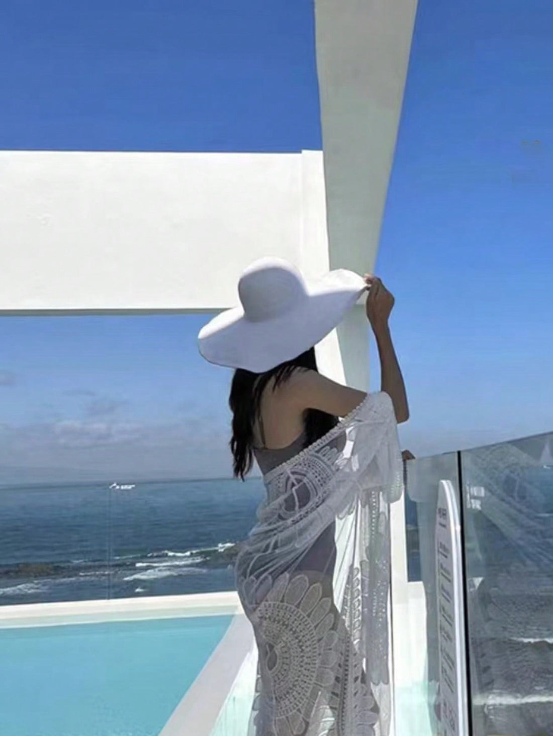 Enhance your holiday wardrobe with our Boho Beach Chic women's hat. Made from durable straw, this wide brim hat exudes a stylish and chic vibe perfect for any beach vacation. With a solid color design, elevate your look and protect yourself from the sun's harmful rays.