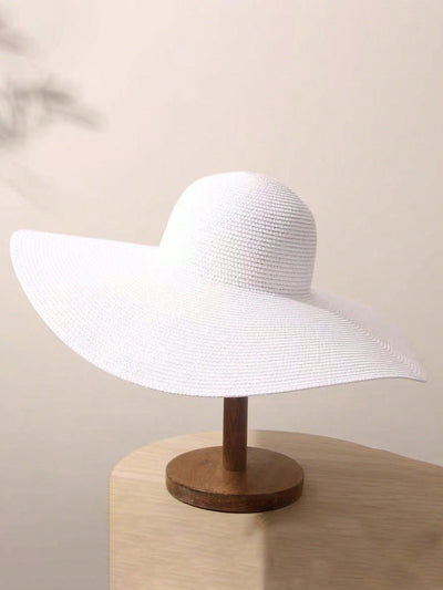 Boho Beach Chic: Women's Solid Wide Brim Straw Hat for Holiday Vibes