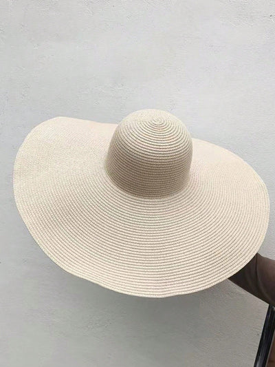 Boho Beach Chic: Women's Solid Wide Brim Straw Hat for Holiday Vibes