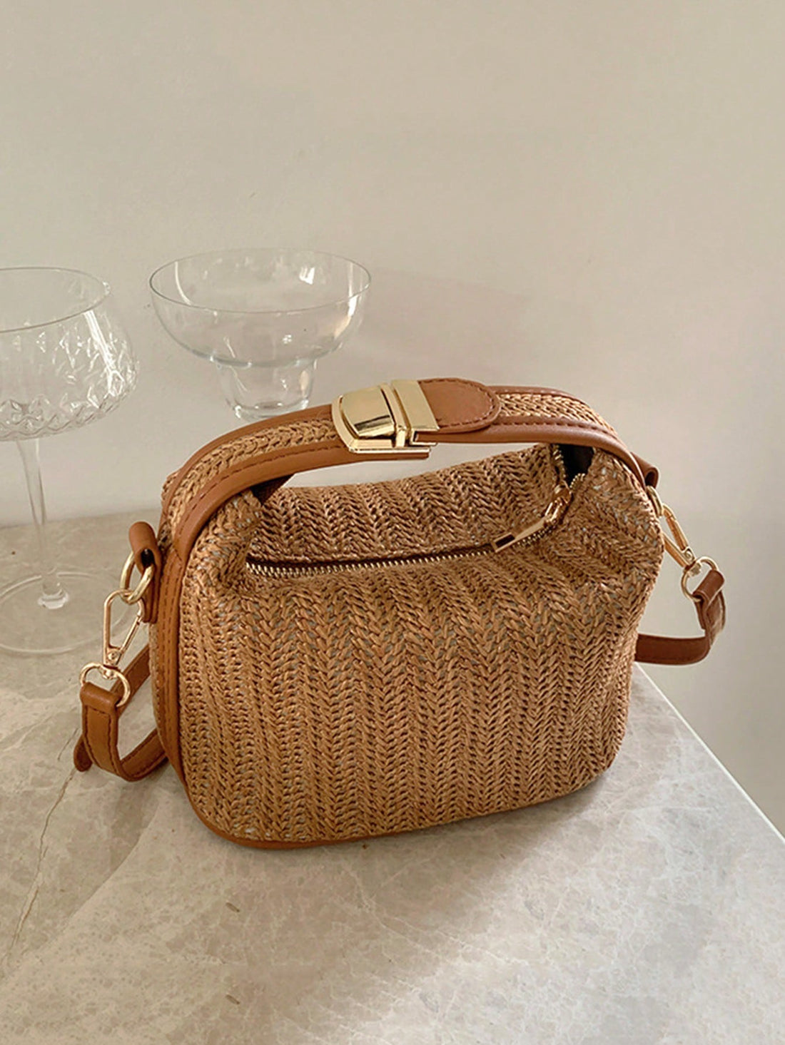 Introducing the Summer Romance Straw Beach Bag - the perfect companion for your summer adventures. With its large capacity, you'll never have to leave anything behind. The crossbody design allows for hands-free convenience. This stylish bag is made of durable straw and is perfect for a day at the beach or a casual outing. Make a statement with the Summer Romance Straw Beach Bag.