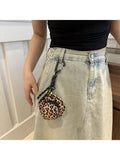 This stylish key bag, designed in the shape of a hat, provides convenient and portable storage for keys. Its candy colors add a touch of fun and playfulness to the design. Keep your keys organized and easily accessible while on the go.