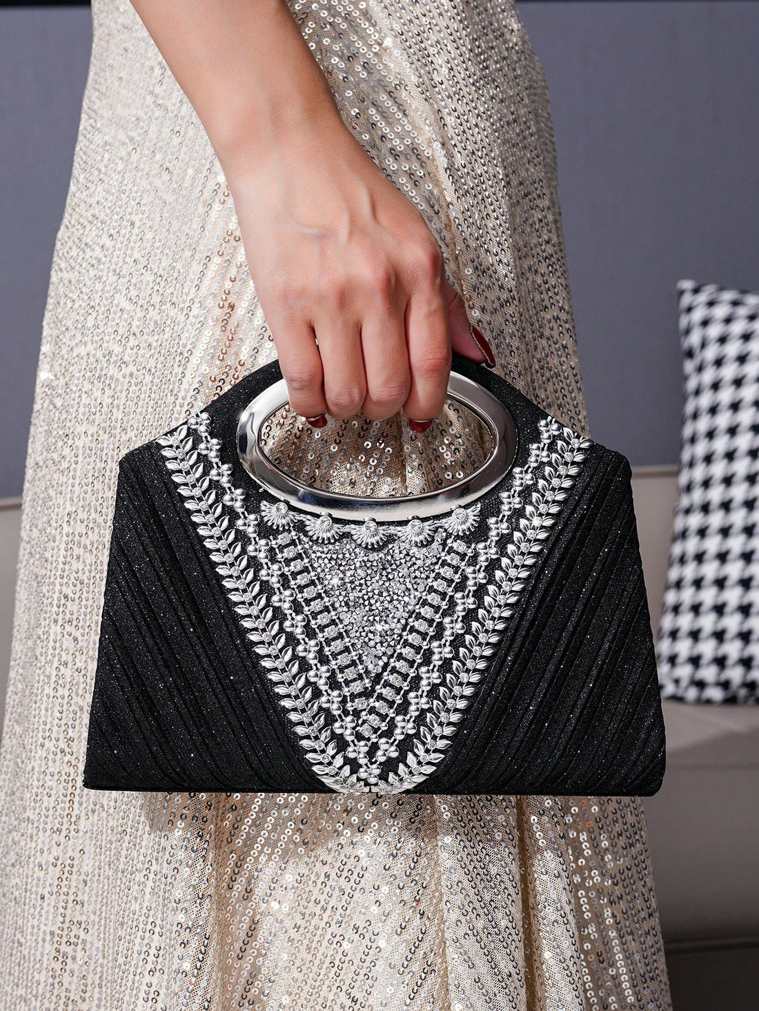 Exude glamour and stand out at any evening party or special event with our Sparkle and Shine: Glitter Handbag. With its shimmering glitter design, this handbag will add a touch of elegance and style to any outfit. Perfect for any occasion, it's a must-have accessory for those who want to shine bright.